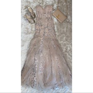 Stunning blush gown with low cut back